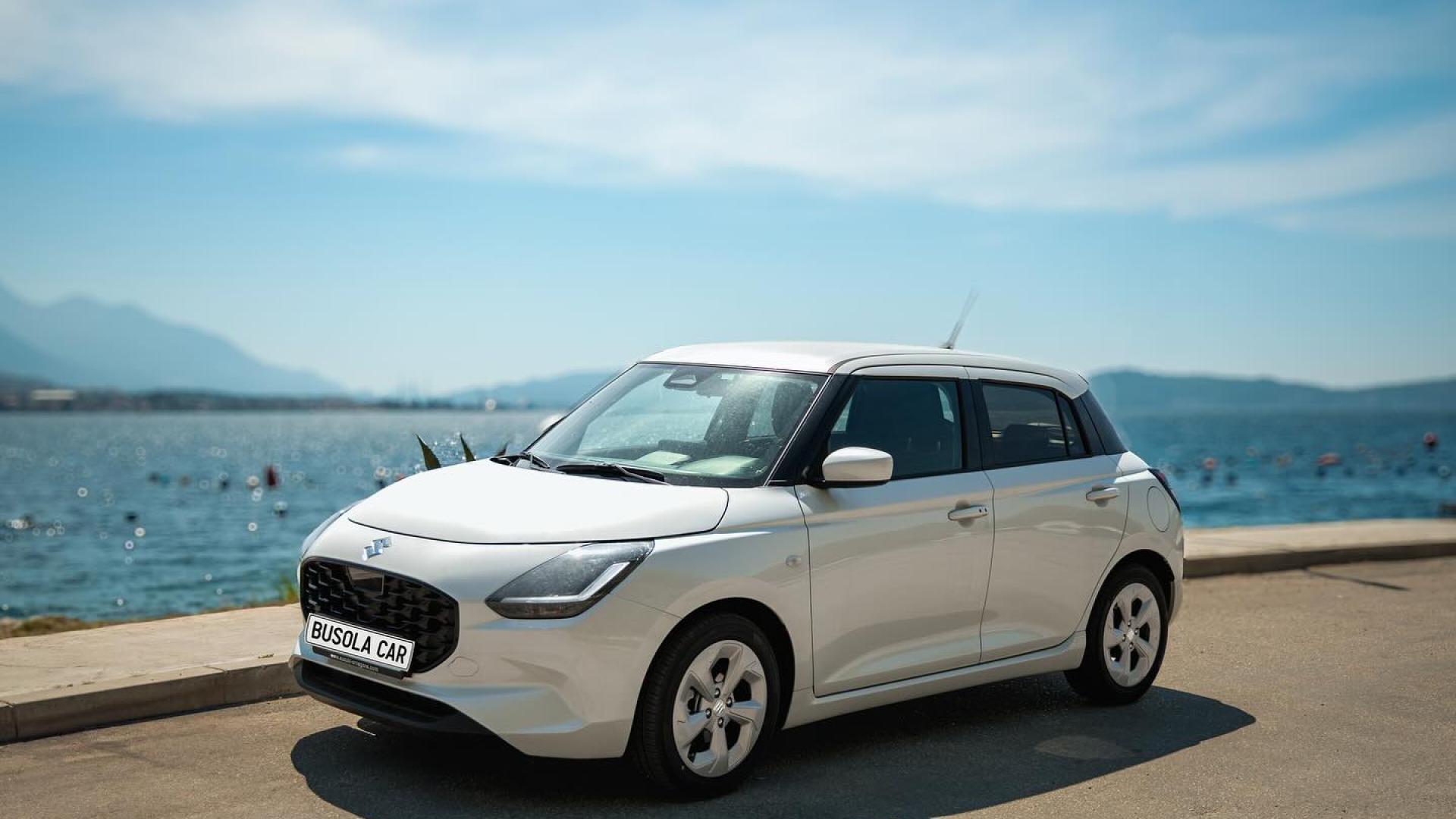 White Suzuki Swift 1.1 Petrol – Busola Rent a Car Herceg Novi