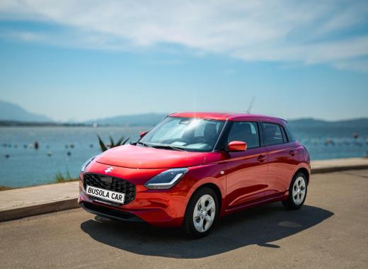 Red Suzuki Swift 1.1 Petrol – Busola Rent a Car Herceg Novi