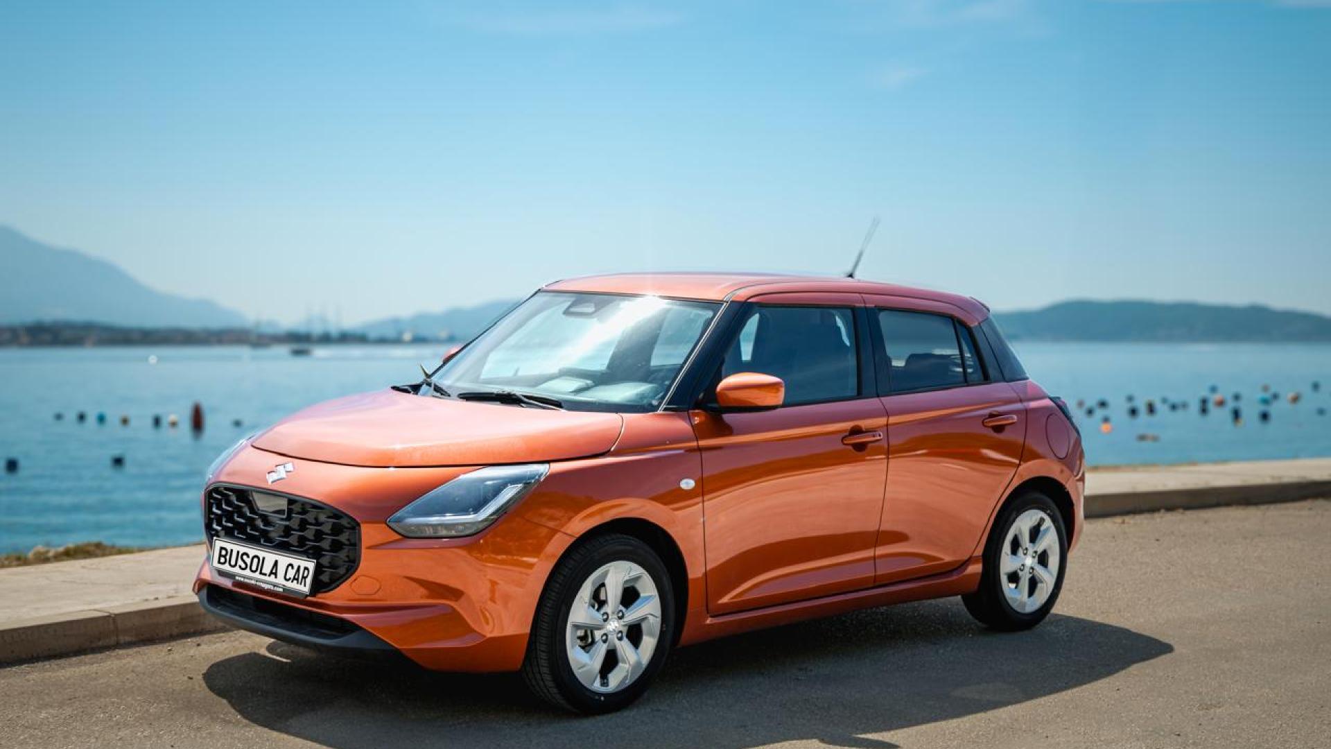 Orange Suzuki Swift 1.1 Petrol – Busola Rent a Car Herceg Novi